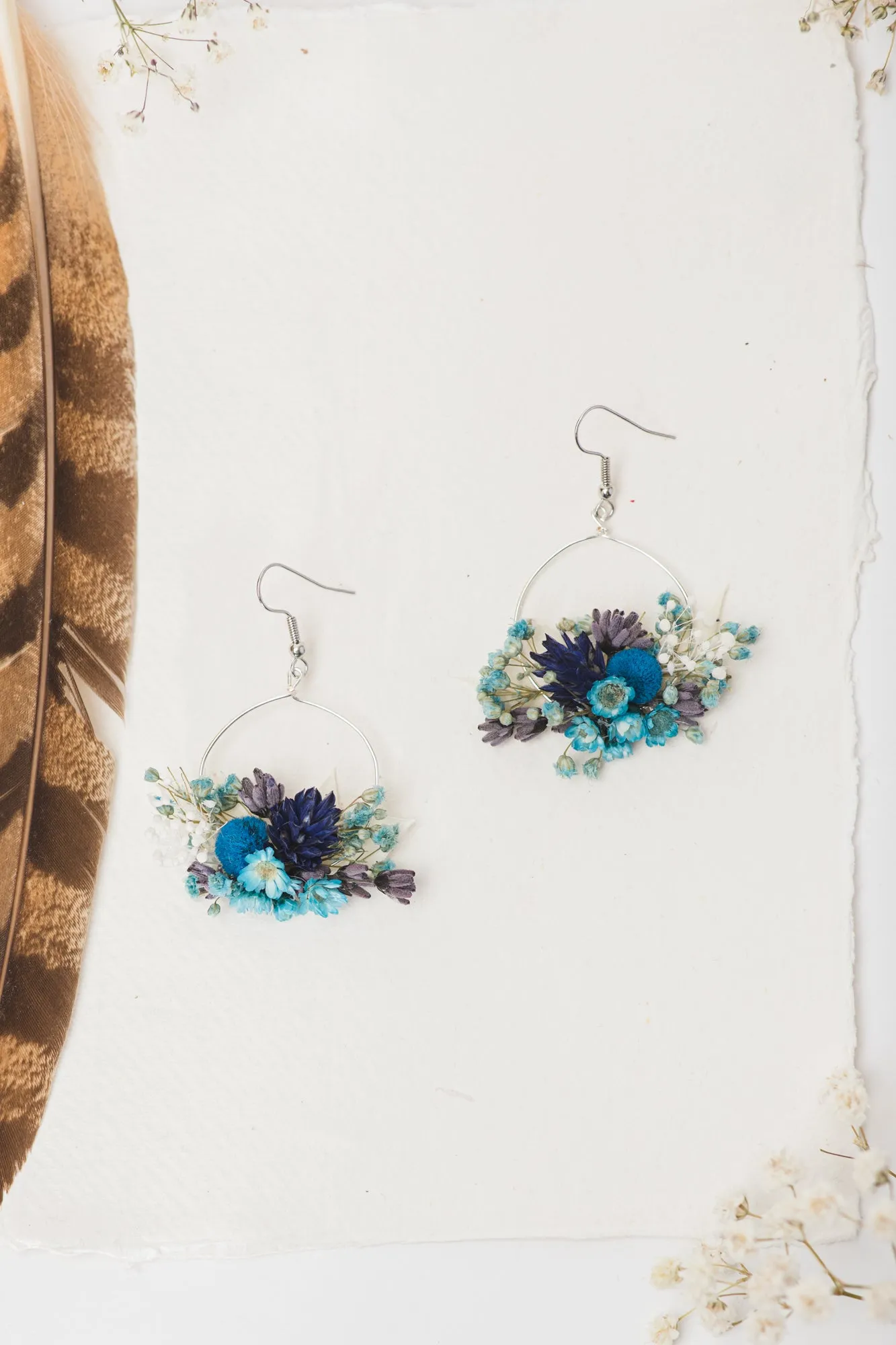 Dried blue circle dangle earrings